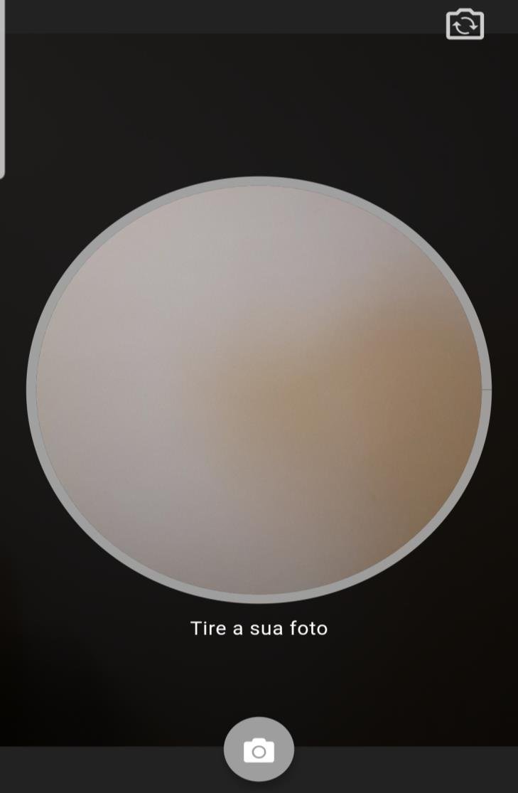 Tela do aplicativo gov.br durante o reconhecimento facial, pedindo para a pessoa tirar uma foto do rosto